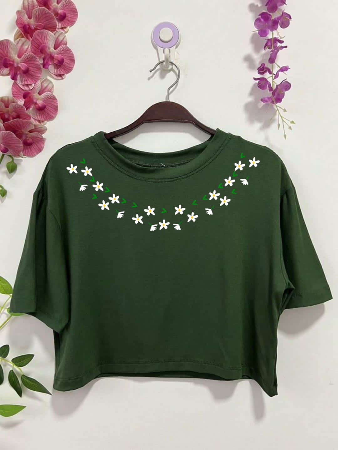 green tee with neck colourful leaves