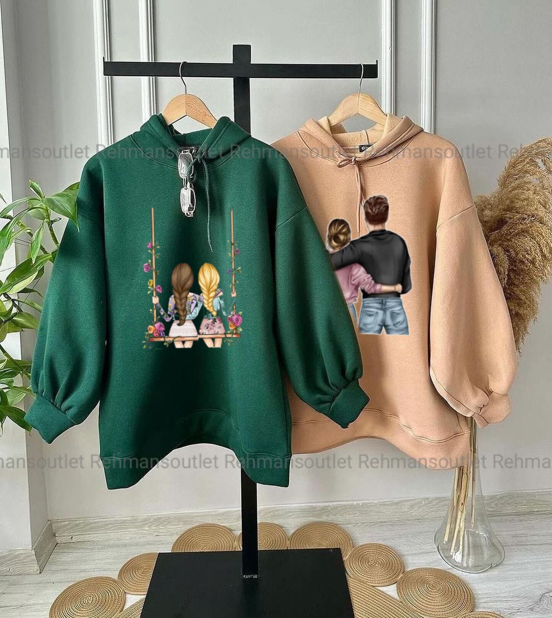 Pack of 2 hoodies two girls swing (green) and girl and boy hug (skin)