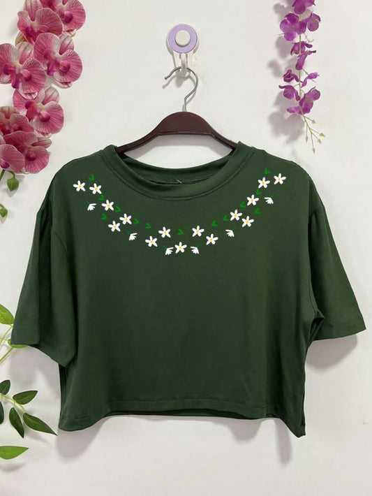 green tee with neck colourful leaves