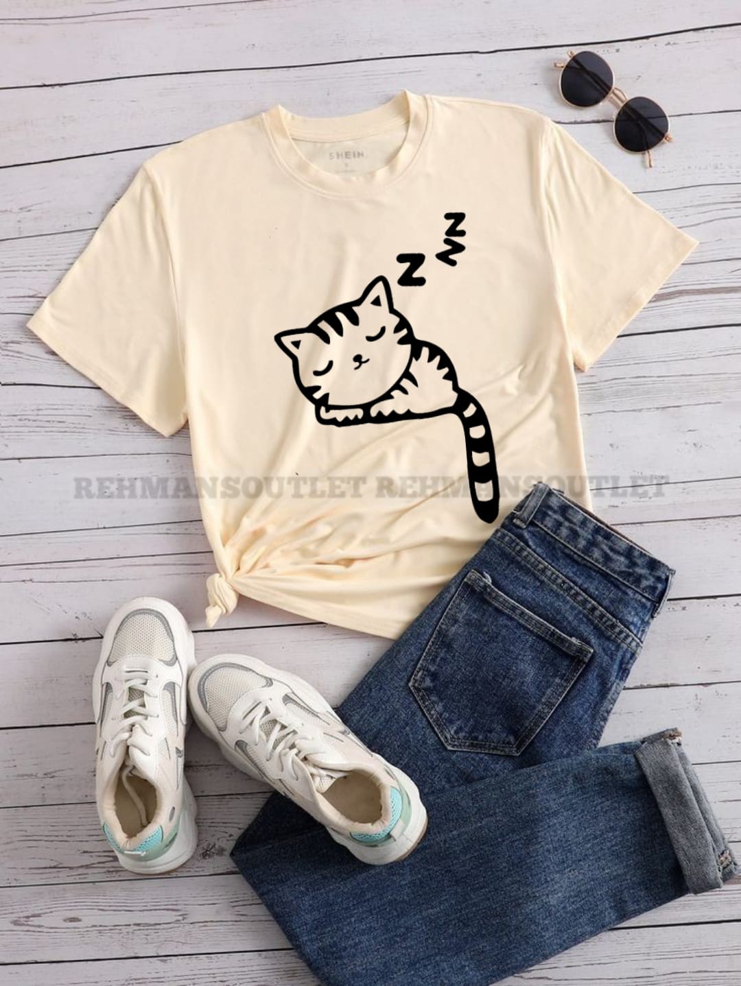 skin tee with cat sleeping