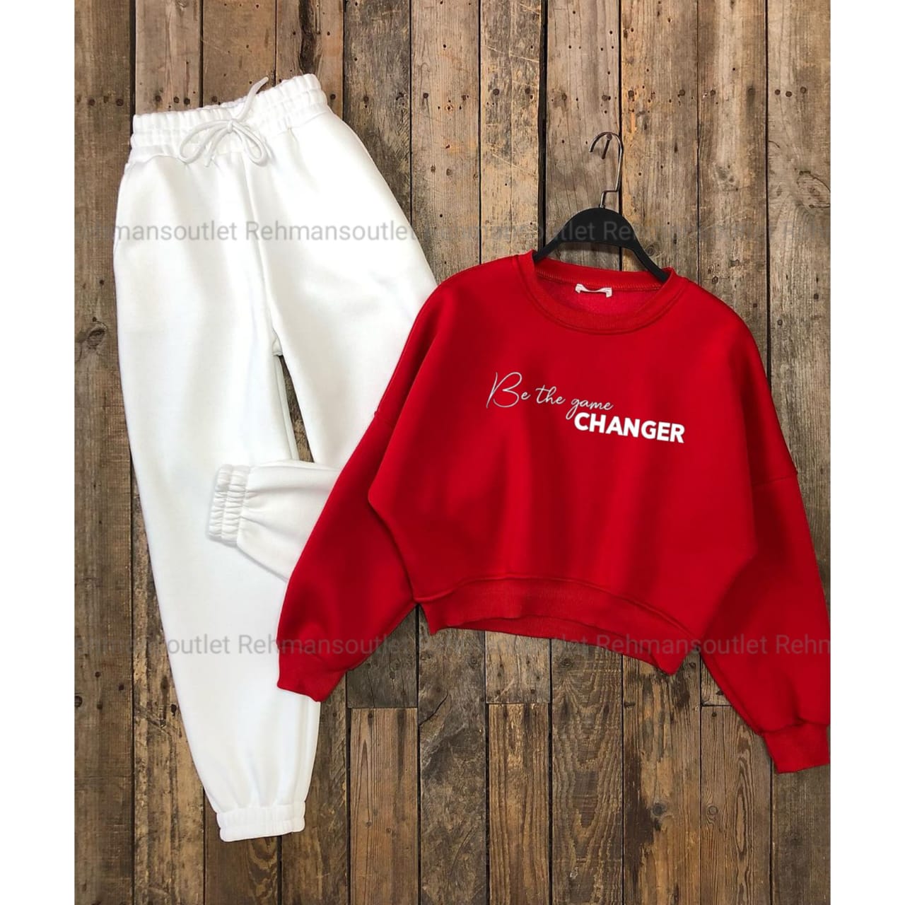 Red sweatshirt with be the game changer and white trouser
